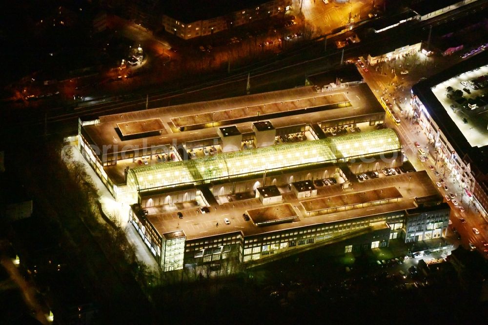 Berlin at night from above - Night lighting building of the shopping center Forum Koepenick in the district Koepenick in Berlin, Germany