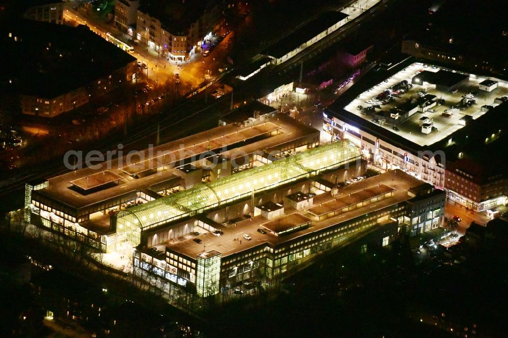 Berlin at night from the bird perspective: Night lighting building of the shopping center Forum Koepenick in the district Koepenick in Berlin, Germany