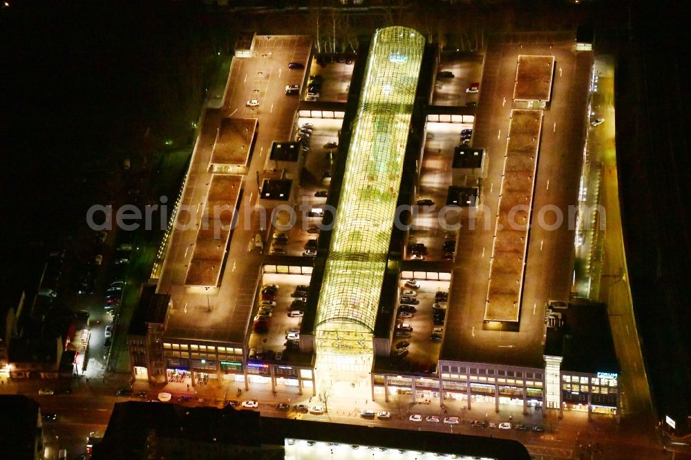 Berlin at night from the bird perspective: Night lighting building of the shopping center Forum Koepenick in the district Koepenick in Berlin, Germany