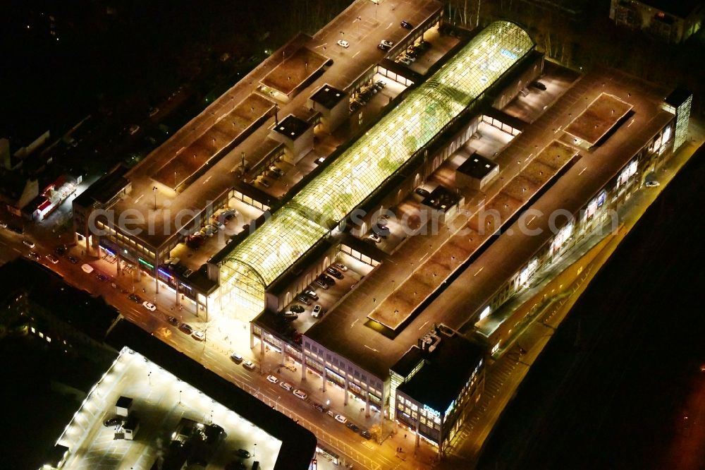 Berlin at night from above - Night lighting building of the shopping center Forum Koepenick in the district Koepenick in Berlin, Germany