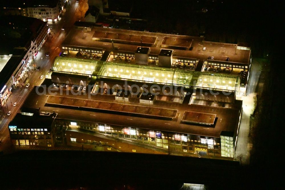 Berlin at night from the bird perspective: Night lighting building of the shopping center Forum Koepenick in the district Koepenick in Berlin, Germany