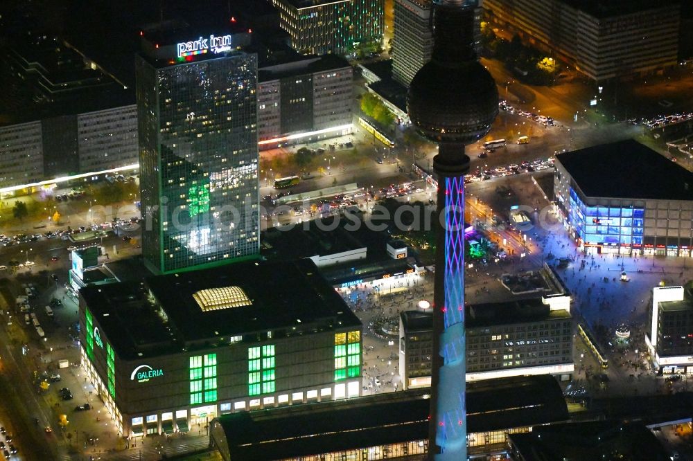 Aerial image at night Berlin - Night lighting Building of the shopping center Galeria Kaufhof Berlin Alexanderplatz in the district Mitte in Berlin, Germany