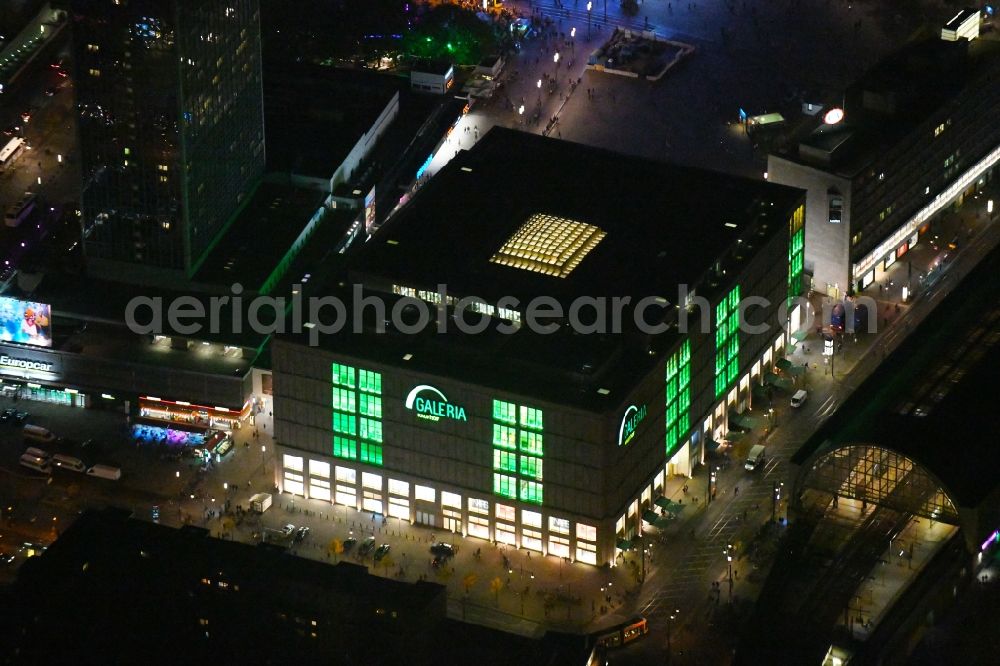 Berlin at night from above - Night lighting Building of the shopping center Galeria Kaufhof in the district Mitte in Berlin, Germany