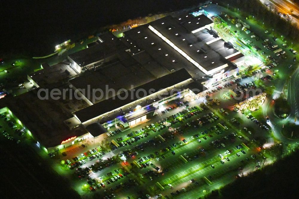 Aerial photograph at night Forchheim - Night lighting Building of the shopping center Globus SB-Warenhaus on Willy-Brandt-Allee in the district Buckenhofen in Forchheim in the state Bavaria, Germany