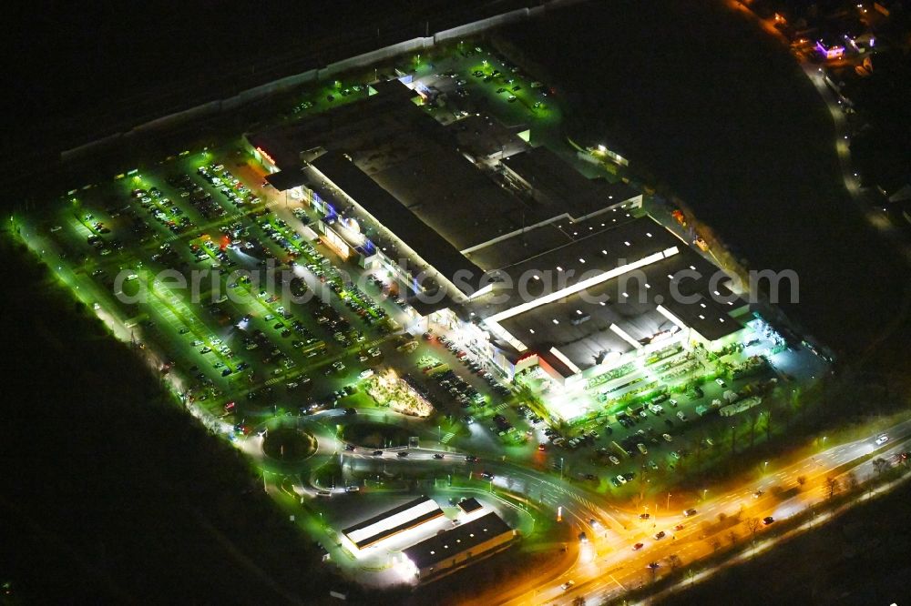 Aerial image at night Forchheim - Night lighting Building of the shopping center Globus SB-Warenhaus on Willy-Brandt-Allee in the district Buckenhofen in Forchheim in the state Bavaria, Germany