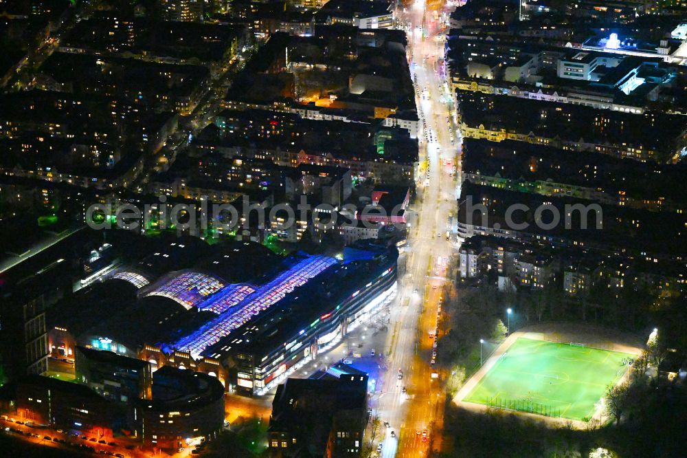 Berlin at night from above - Night lighting Building of the shopping center Hallen on Borsigturm on street Am Borsigturm in the district Tegel in Berlin, Germany