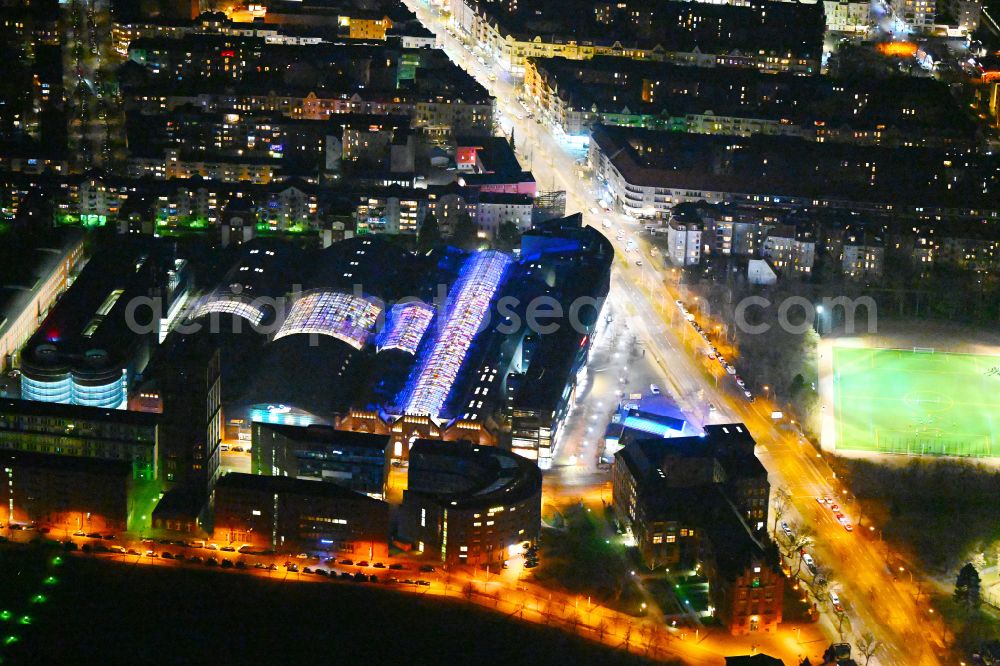 Aerial photograph at night Berlin - Night lighting Building of the shopping center Hallen on Borsigturm on street Am Borsigturm in the district Tegel in Berlin, Germany