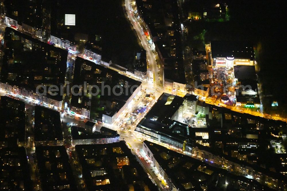 Berlin at night from above - Night lighting Building of the shopping center Karstadt Berlin on Hermannplatz in the district Kreuzberg in Berlin, Germany