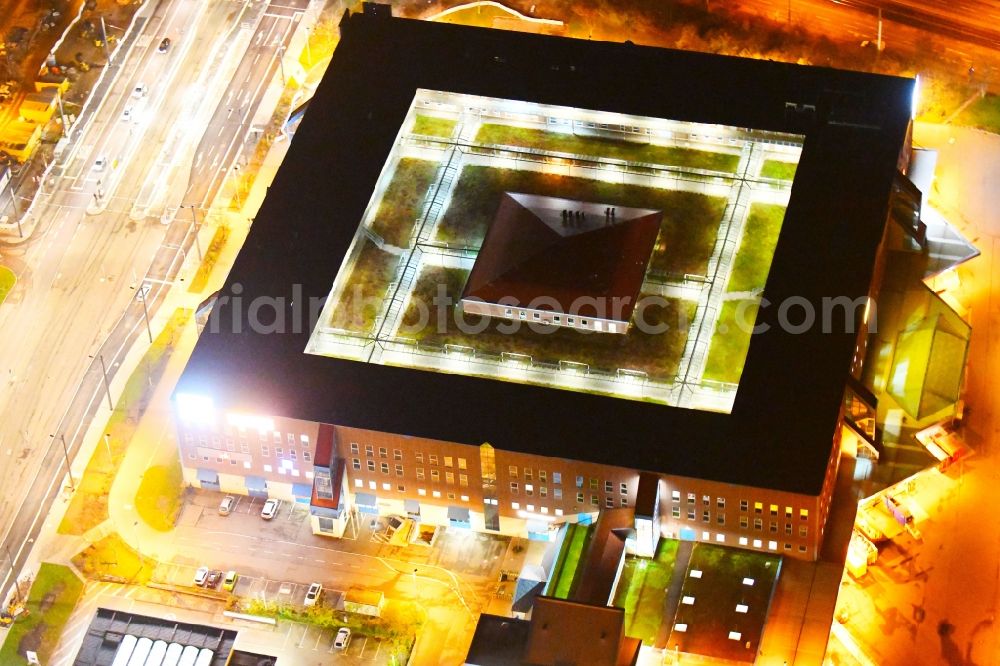 Aerial image at night Halle (Saale) - Night lighting Building of the shopping center Kaufland on Suedstadtring in the district Sued in Halle (Saale) in the state Saxony-Anhalt, Germany