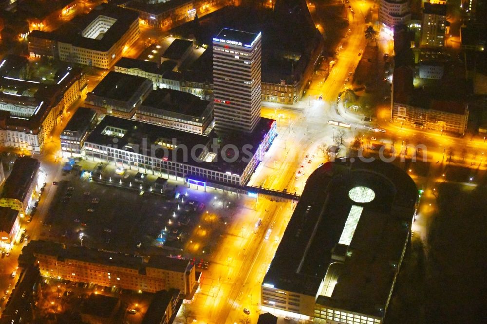 Frankfurt (Oder) at night from above - Night lighting Building of the shopping center Lenne-Passagen on Platz of Republik - Karl-Marx-Strasse in Frankfurt (Oder) in the state Brandenburg, Germany