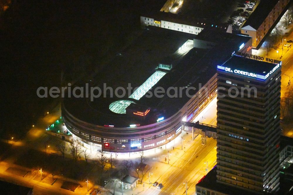 Frankfurt (Oder) at night from above - Night lighting Building of the shopping center Lenne-Passagen on Platz of Republik - Karl-Marx-Strasse in Frankfurt (Oder) in the state Brandenburg, Germany