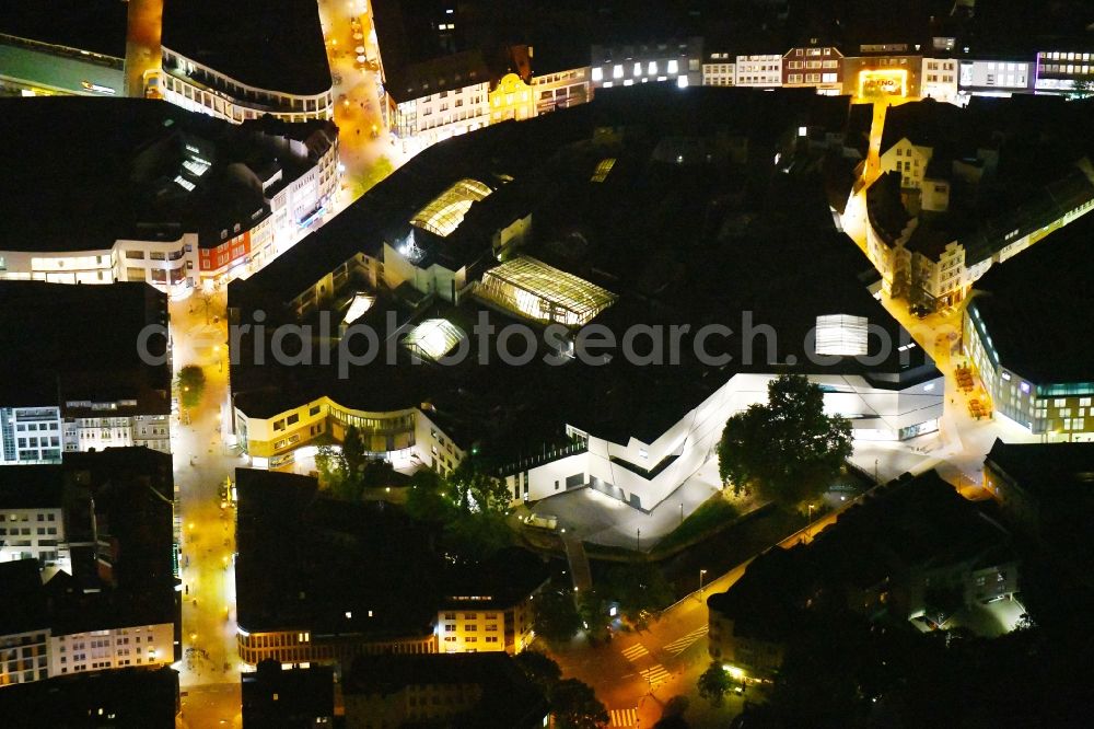 Osnabrück at night from above - Night lighting Building of the shopping center L&T Markthalle along the Grossen Strasse in the district Innenstadt in Osnabrueck in the state Lower Saxony, Germany