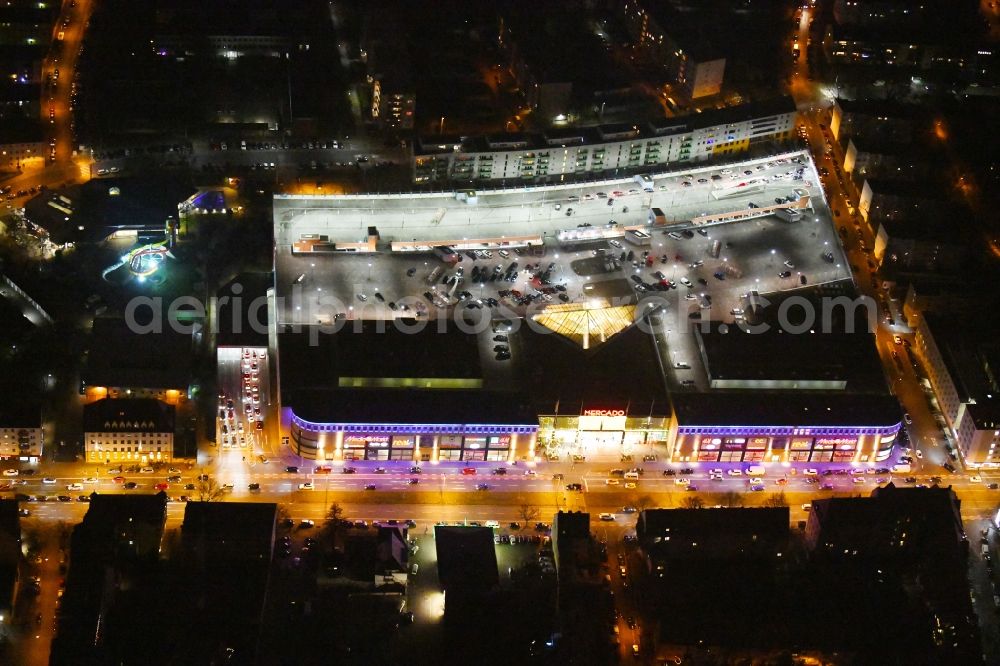 Aerial image at night Nürnberg - Night lighting Building of the shopping center Mercado on Aeussere Bayreuther Strasse in the district Schoppershof in Nuremberg in the state Bavaria, Germany