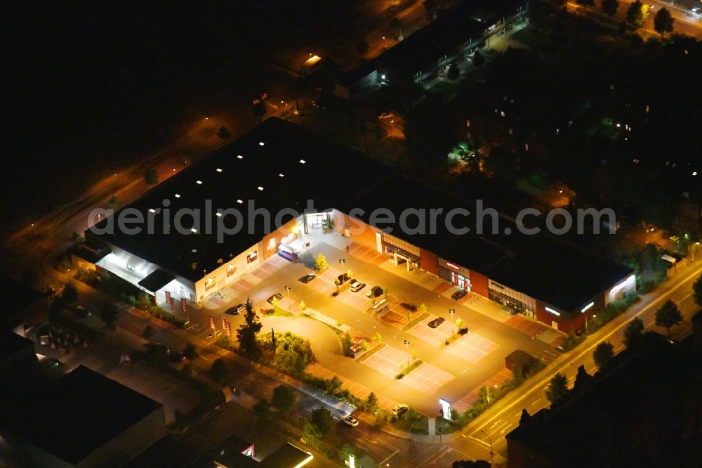 Potsdam at night from above - Night lighting building of the shopping center on Nedlitzer Strasse in the district Bornstedt in Potsdam in the state Brandenburg, Germany