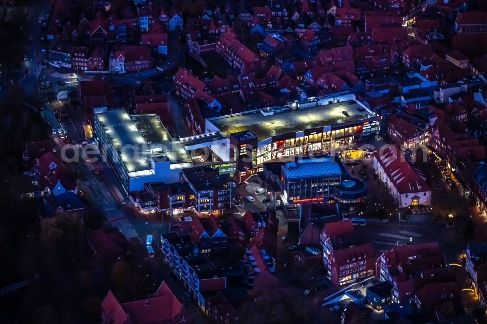 Stade at night from above - Night lighting building of the shopping center Neuer Pferdemarkt in Stade in the state Lower Saxony, Germany