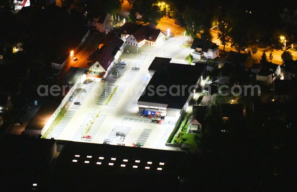 Potsdam at night from above - Night lighting building of the shopping center on Potsdamer Strasse in the district Bornstedt in Potsdam in the state Brandenburg, Germany