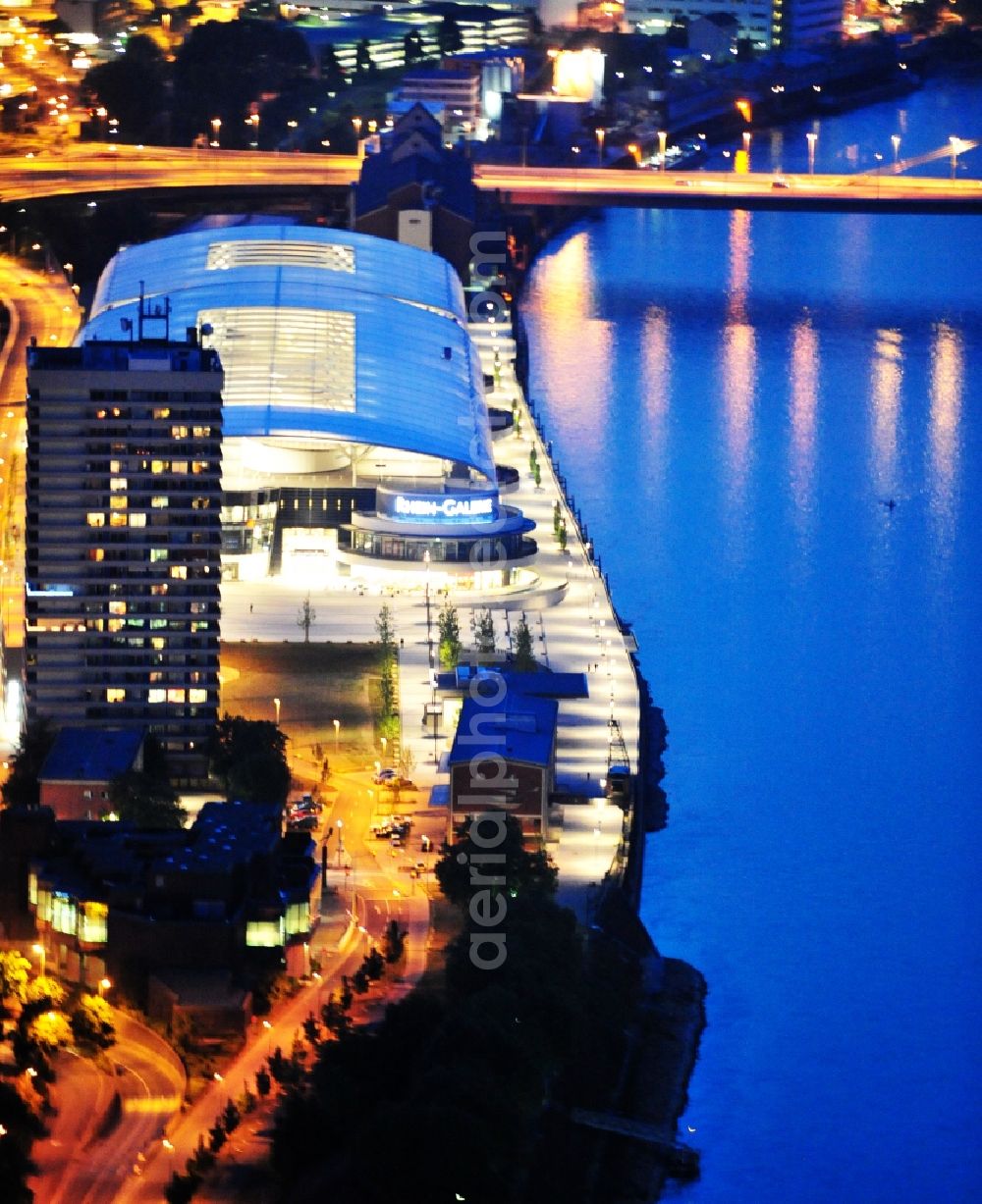 Ludwigshafen am Rhein at night from above - Night lighting building of the shopping center Rhein-Galerie in Ludwigshafen am Rhein in the state Rhineland-Palatinate, Germany