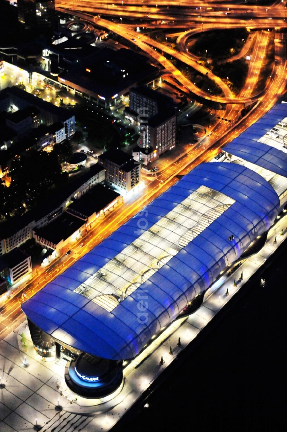 Ludwigshafen am Rhein at night from the bird perspective: Night lighting building of the shopping center Rhein-Galerie in Ludwigshafen am Rhein in the state Rhineland-Palatinate, Germany