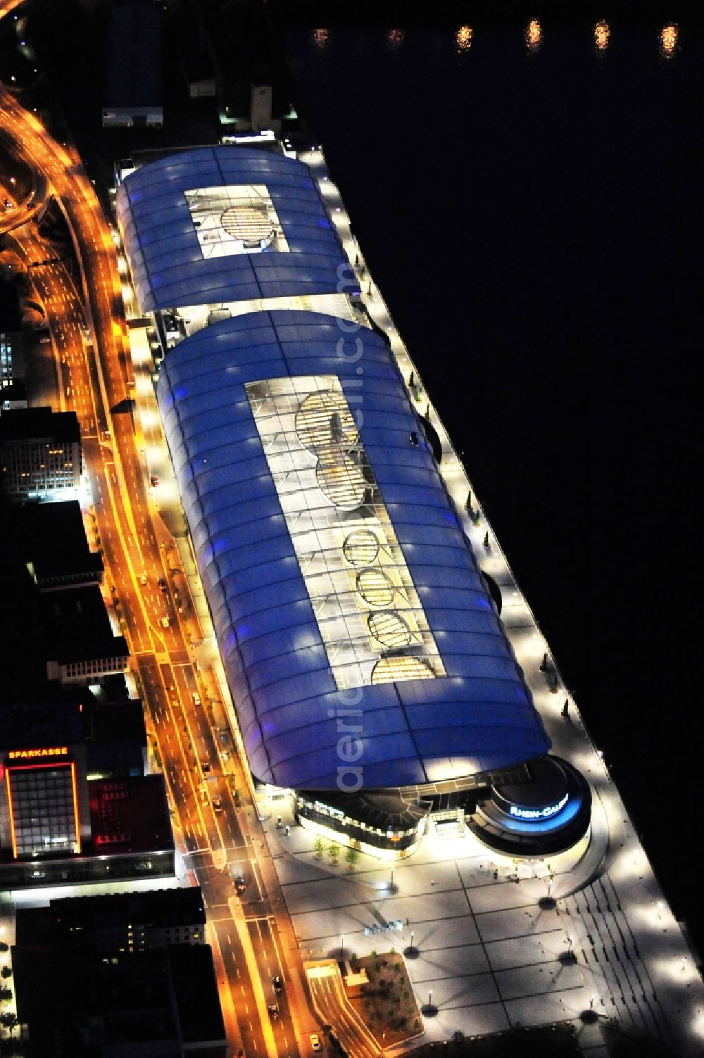 Ludwigshafen am Rhein at night from above - Night lighting building of the shopping center Rhein-Galerie in Ludwigshafen am Rhein in the state Rhineland-Palatinate, Germany