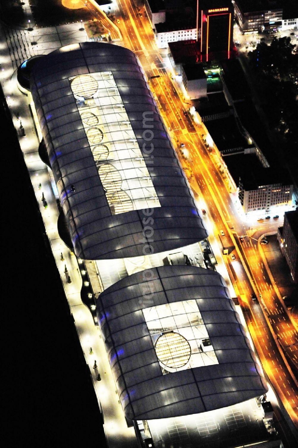 Ludwigshafen am Rhein at night from the bird perspective: Night lighting building of the shopping center Rhein-Galerie in Ludwigshafen am Rhein in the state Rhineland-Palatinate, Germany