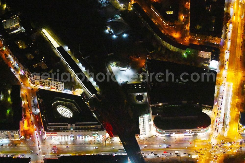 Berlin at night from above - Night lighting Building of the shopping center Ring-Center Berlin on Frankfurter Allee in the district Friedrichshain in Berlin, Germany