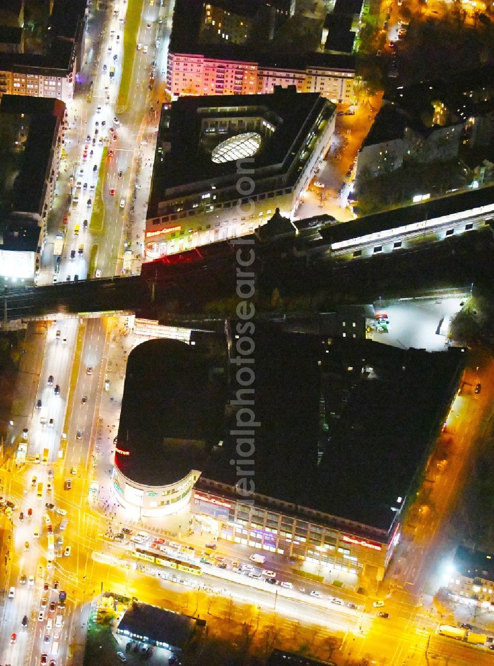 Berlin at night from above - Night lighting Building of the shopping center Ring-Center Berlin on Frankfurter Allee in the district Friedrichshain in Berlin, Germany