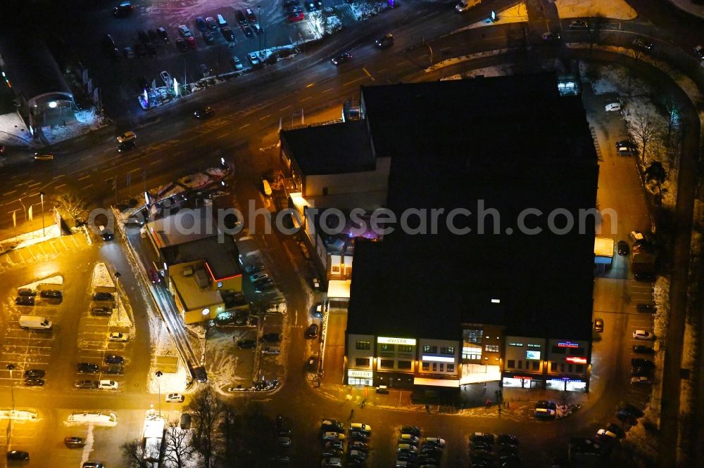 Lübeck at night from above - Night lighting building of the shopping center of Rusta Retail GmbH bei der Lohmuehle in the district Holstentor Nord in Luebeck in the state Schleswig-Holstein, Germany