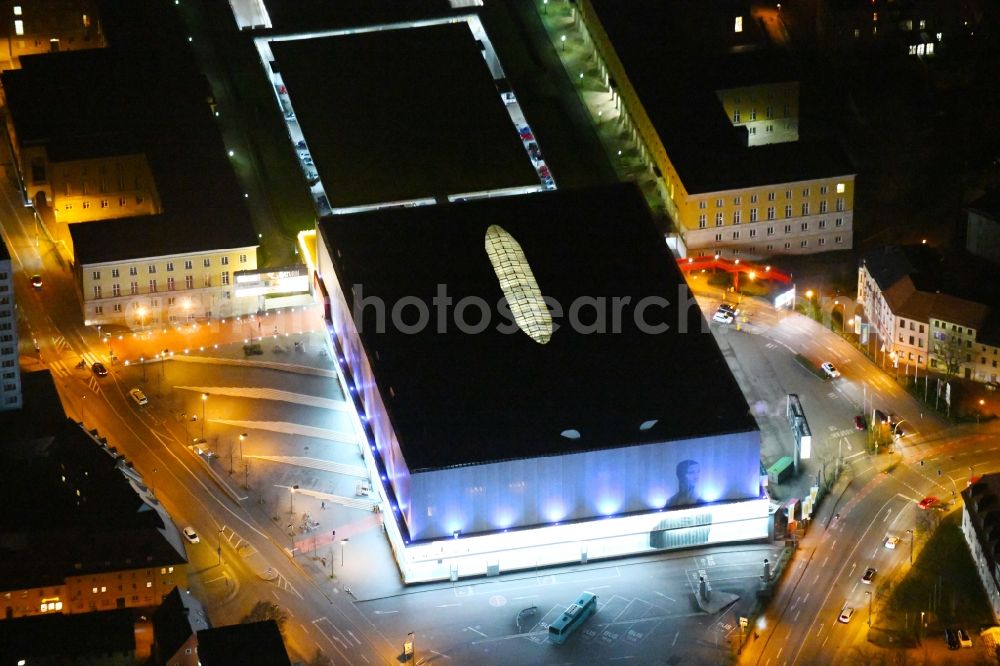 Aerial image at night Weimar - Night lighting Building of the shopping center Weimar Atrium on Friedensstrasse in Weimar in the state Thuringia, Germany