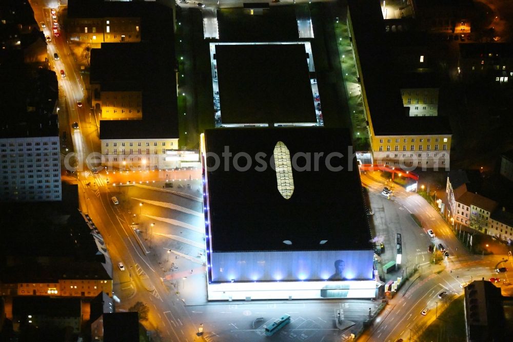 Weimar at night from above - Night lighting Building of the shopping center Weimar Atrium on Friedensstrasse in Weimar in the state Thuringia, Germany