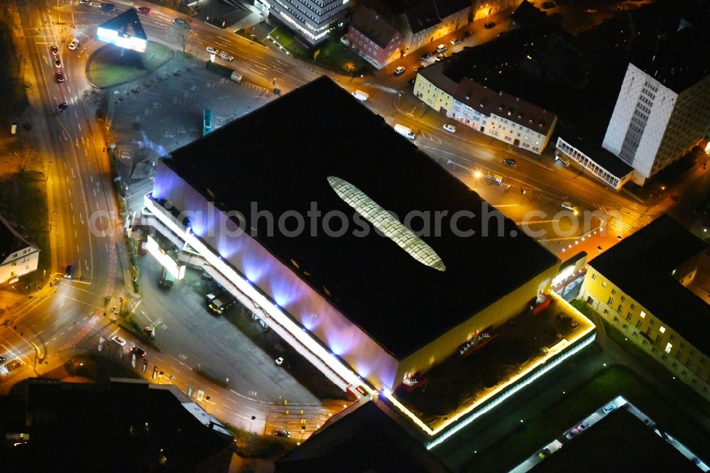 Aerial photograph at night Weimar - Night lighting Building of the shopping center Weimar Atrium on Friedensstrasse in Weimar in the state Thuringia, Germany