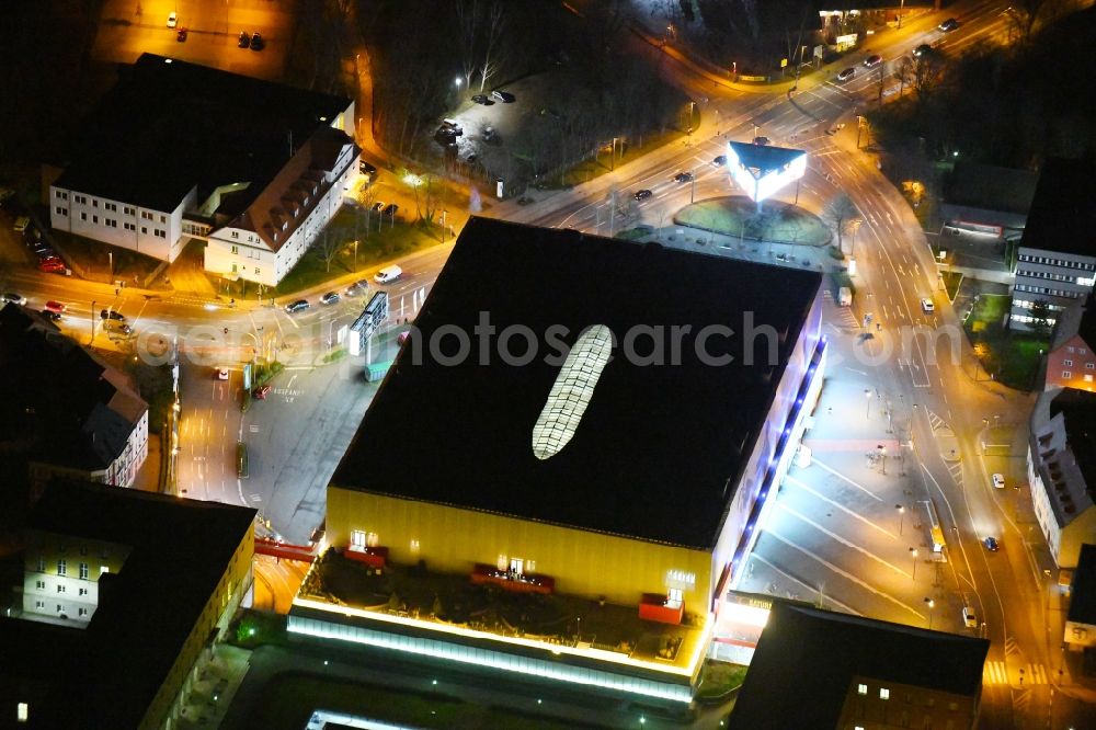 Aerial image at night Weimar - Night lighting Building of the shopping center Weimar Atrium on Friedensstrasse in Weimar in the state Thuringia, Germany