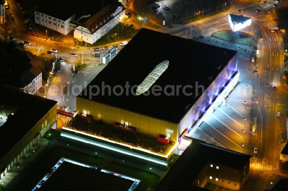 Weimar at night from above - Night lighting Building of the shopping center Weimar Atrium on Friedensstrasse in Weimar in the state Thuringia, Germany