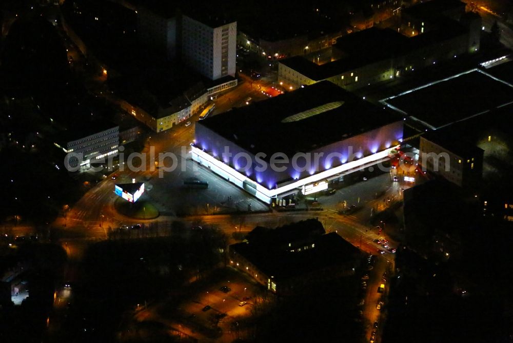 Aerial image at night Weimar - Night lighting Building of the shopping center Weimar Atrium on Friedensstrasse in Weimar in the state Thuringia, Germany