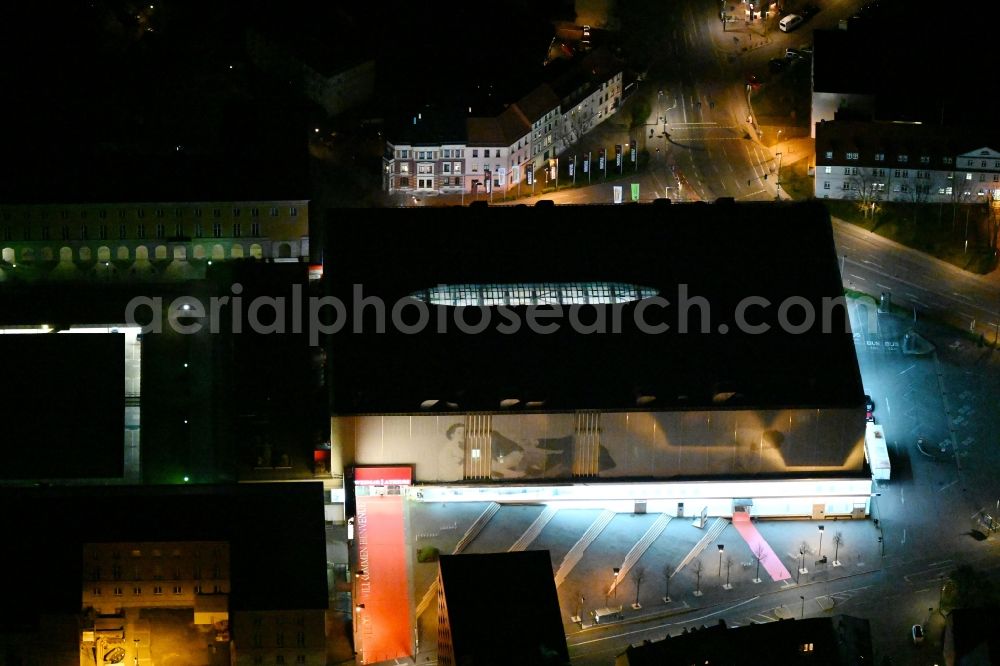 Weimar at night from above - Night lighting building of the shopping center Weimar Atrium on Friedensstrasse in Weimar in the state Thuringia, Germany