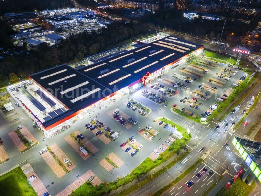 Dresden at night from above - Night lighting building complex of the shopping center Kaufpark Dresden on Dohnaer Strasse in the Lockwitz district of Dresden in the state of Saxony, Germany