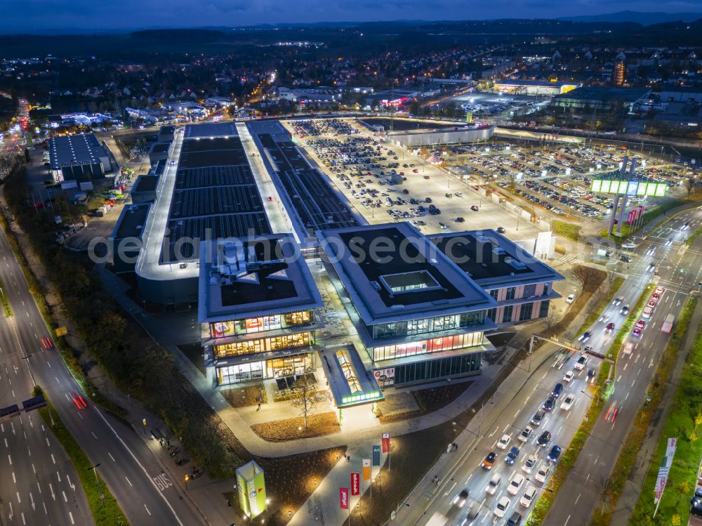 Aerial photograph at night Dresden - Night lighting building complex of the shopping center Kaufpark Dresden on Dohnaer Strasse in the Lockwitz district of Dresden in the state of Saxony, Germany