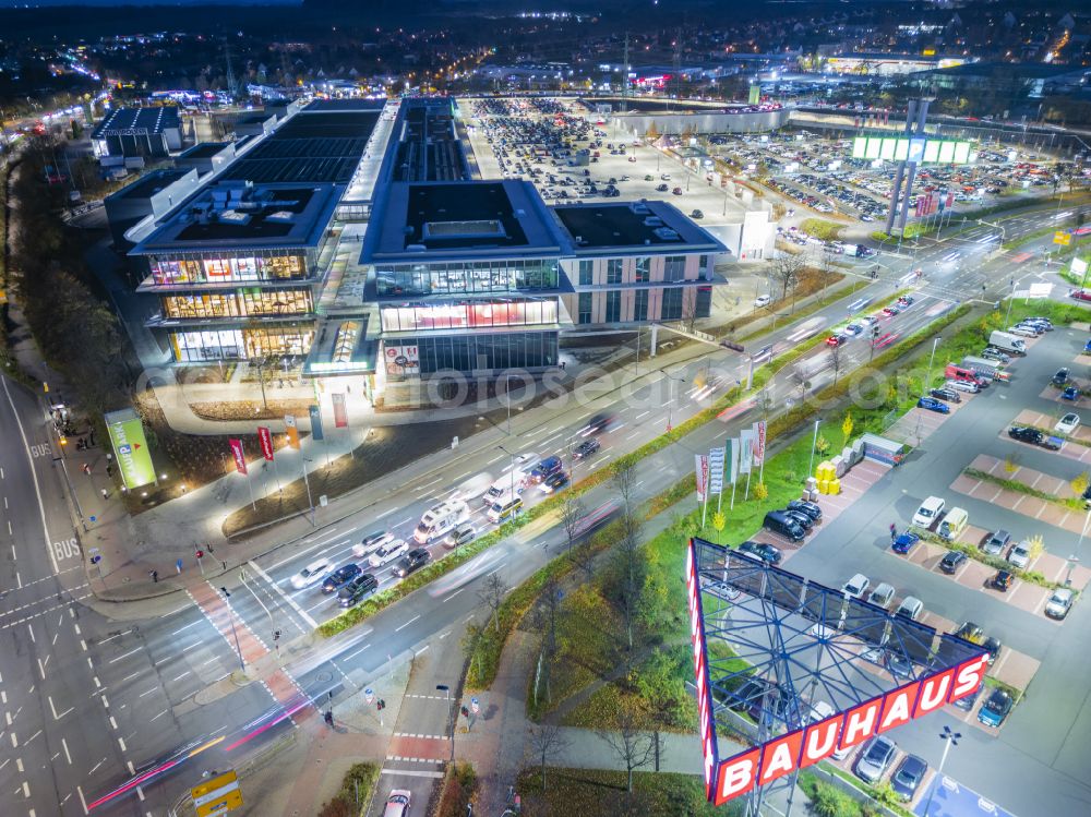 Dresden at night from the bird perspective: Night lighting building complex of the shopping center Kaufpark Dresden on Dohnaer Strasse in the Lockwitz district of Dresden in the state of Saxony, Germany