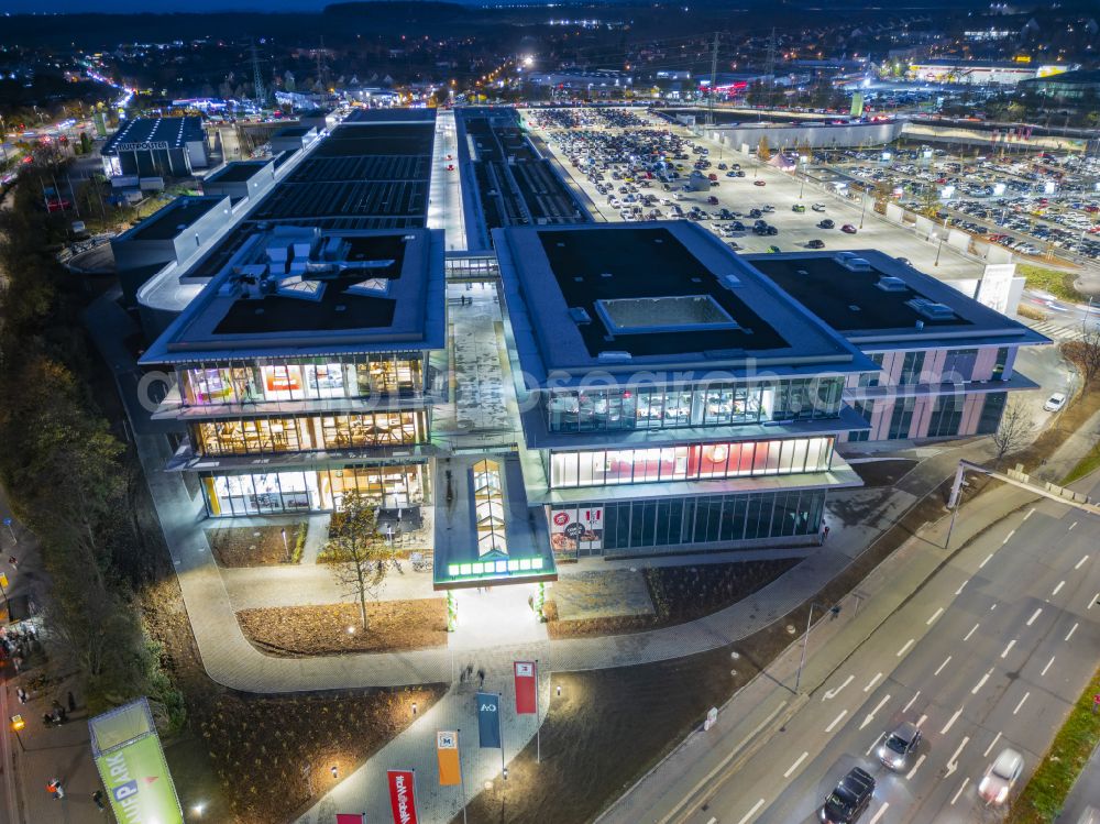 Aerial photograph at night Dresden - Night lighting building complex of the shopping center Kaufpark Dresden on Dohnaer Strasse in the Lockwitz district of Dresden in the state of Saxony, Germany