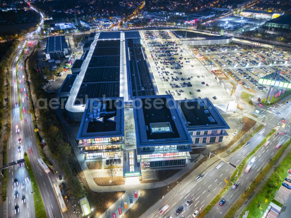 Aerial image at night Dresden - Night lighting building complex of the shopping center Kaufpark Dresden on Dohnaer Strasse in the Lockwitz district of Dresden in the state of Saxony, Germany