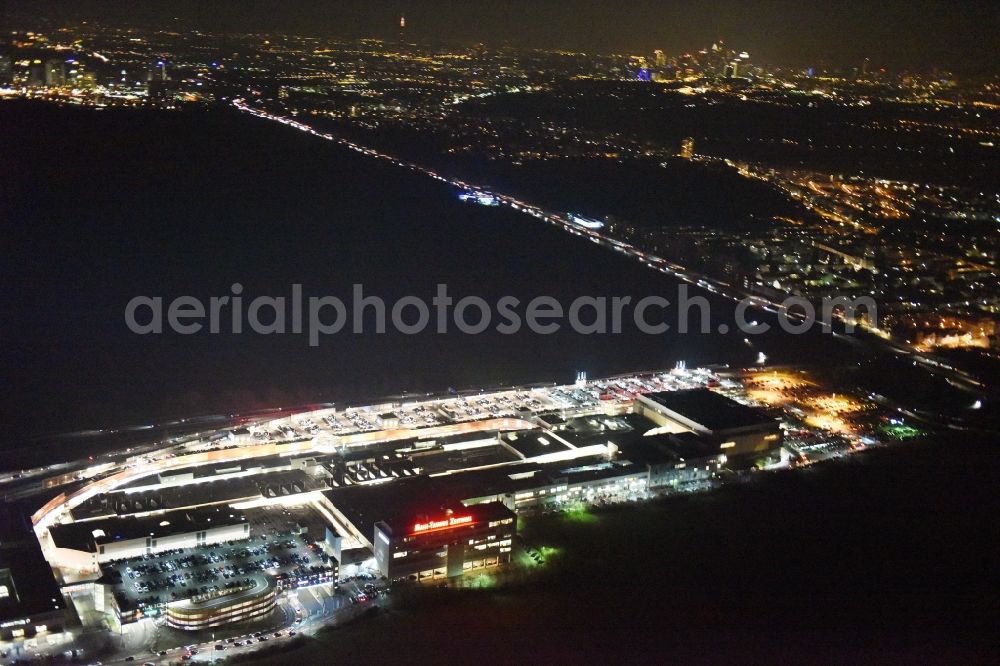 Sulzbach (Taunus) at night from the bird perspective: Night view Shopping center MTZ Main-Taunus - Center in Sulzbach / Hesse