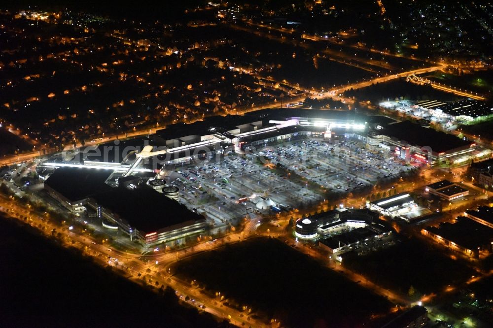 Leipzig at night from the bird perspective: Building of the shopping center Paunsdorf Center of Unibail-Rodamco Germany GmbH in Leipzig in the state Saxony