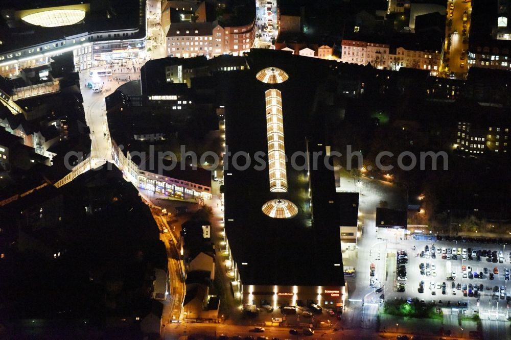 Schwerin at night from above - Night view cityscape of downtown at the Marienplatz with the shopping center Castle Park Center of the ECE group in Schwerin in Mecklenburg - Western Pomerania