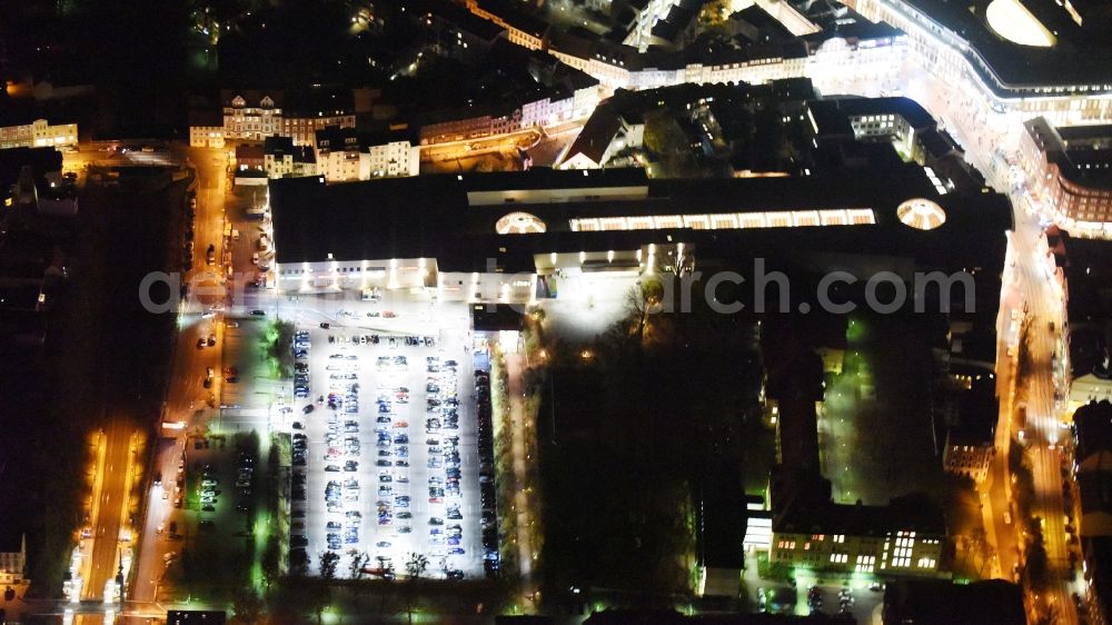 Schwerin at night from above - Night view cityscape of downtown at the Marienplatz with the shopping center Castle Park Center of the ECE group in Schwerin in Mecklenburg - Western Pomerania