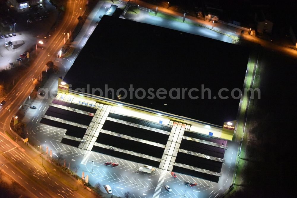 Aschaffenburg at night from above - Night view Building of the shopping center SELGROS Cash & Carry Aschaffenburg on Neue Glattbacher Strasse in Aschaffenburg in the state Bavaria