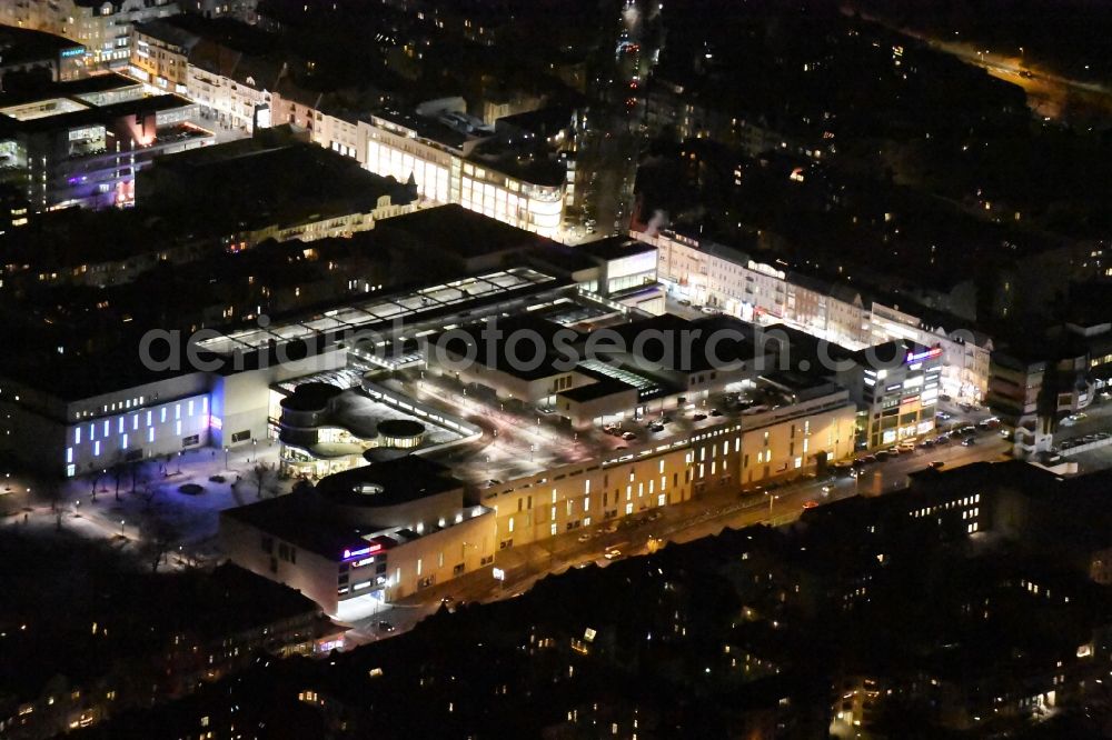 Aerial photograph at night Berlin - Night lighting at the shopping center Boulevard Berlin at Schlossstrasse, Schildhornstrasse, Lepsiusstrasse, Markelstrasse in Berlin-Steglitz. The building contractor was BAM Germany