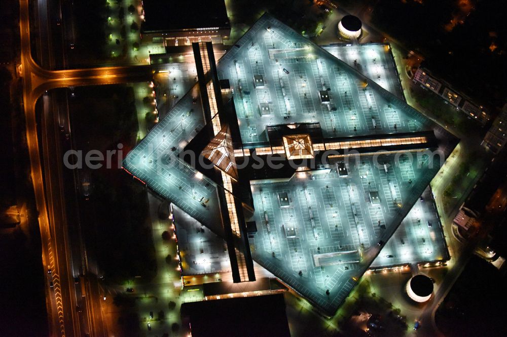 Aerial image at night Potsdam - Night lighting building of the shopping center Stern-Center in the district Drewitz in Potsdam in the state Brandenburg, Germany