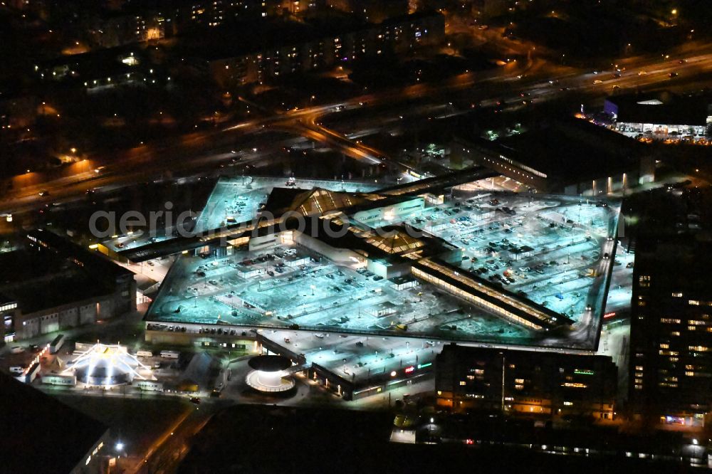 Aerial photograph at night Potsdam - Night lighting building of the shopping center Stern-Center in the district Drewitz in Potsdam in the state Brandenburg, Germany