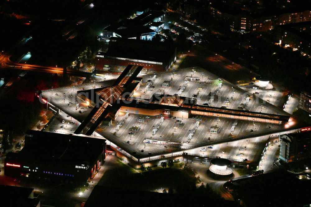 Aerial photograph at night Potsdam - Night lighting building of the shopping center Stern-Center in the district Drewitz in Potsdam in the state Brandenburg, Germany