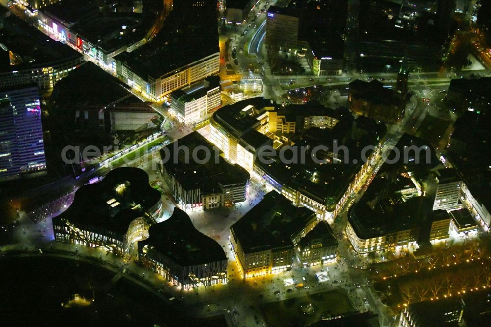 Aerial photograph at night Düsseldorf - Night lighting construction of retail and office property Koe-Bogen in Dusseldorf in North Rhine-Westphalia