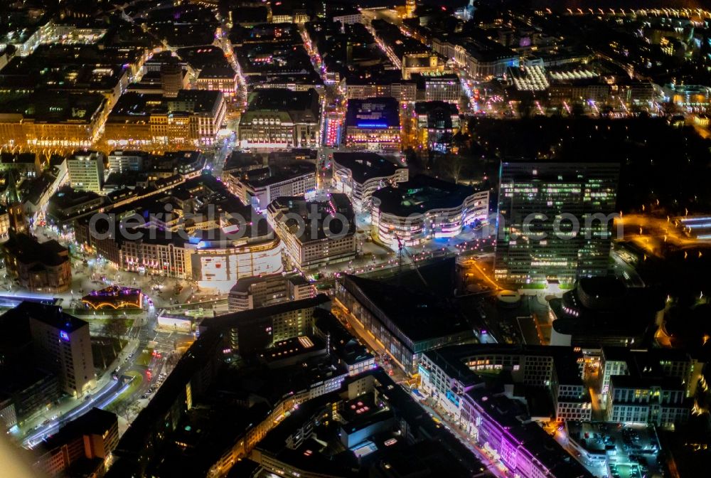 Aerial photograph at night Düsseldorf - Night lighting construction of retail and office property Koe-Bogen in Dusseldorf in North Rhine-Westphalia